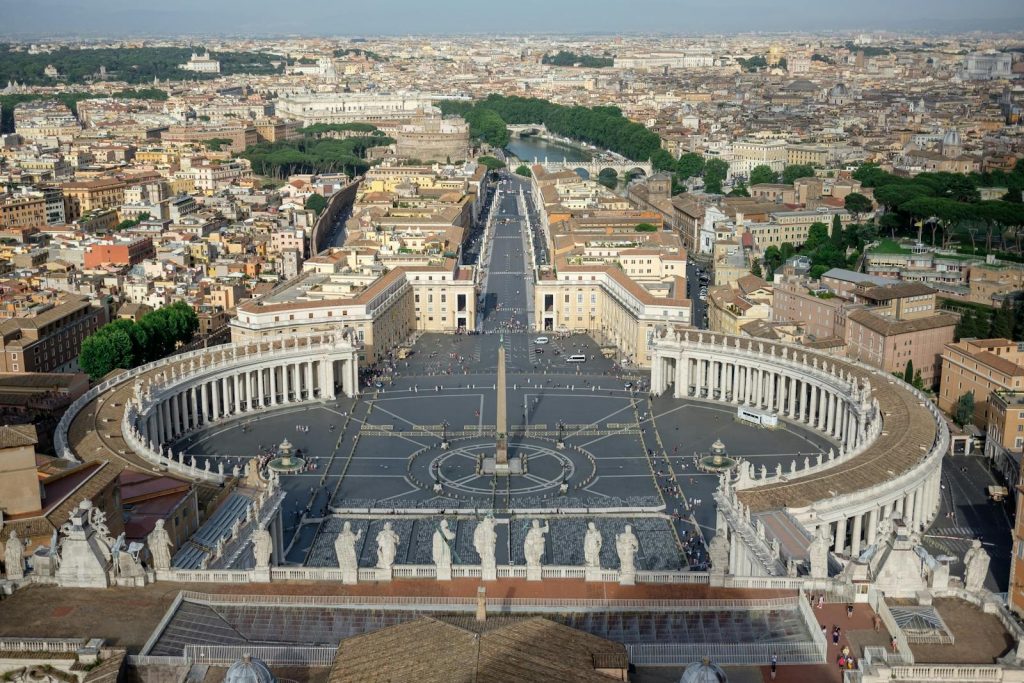 Stunning aerial view of St. Peter's Square in Vatican City, showcasing iconic architecture.