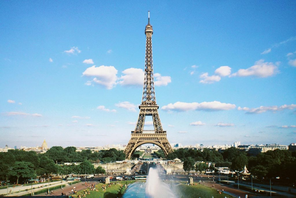 Stunning view of the Eiffel Tower on a sunny day in Paris, capturing the essence of French architecture.